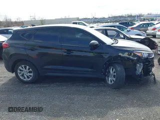 2019 Hyundai Tucson SE with VIN KM8J2CA46KU977863, listed as a IAAI auction lot 41704318 with 23,076 mi miles. Bid and sale history available at carsss.com. Image 13.