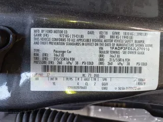 2018 Ford Focus SE with VIN 1FADP3FE6JL270910, listed as a IAAI auction lot 42130371 with 121,240 mi miles. Bid and sale history available at carsss.com. Image 9.