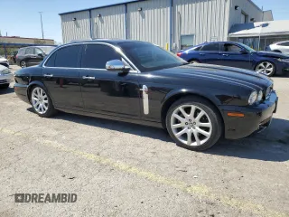 2009 Jaguar XJ 8 with VIN SAJWA71B79SH30431, listed as a Copart auction lot 52403185 with 67,143 mi miles and Salvage Title. Bid and sale history available at DreamBid. Image 4.