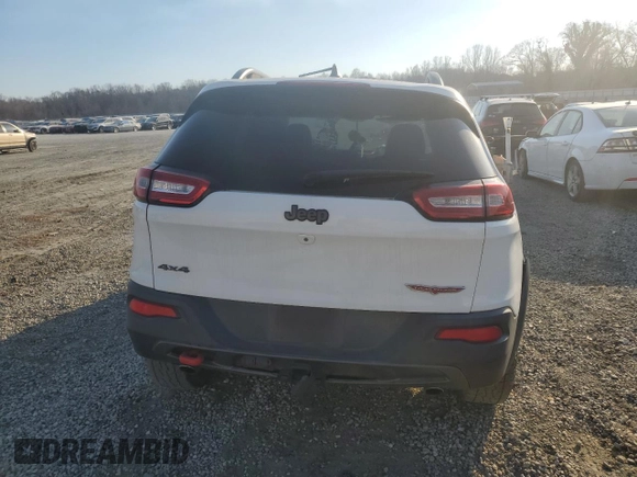 2015 Jeep Cherokee Trailhawk z VIN 1C4PJMBSXFW642149, wystawiony jako Copart lot #46656565 z przebiegiem 100 496 mil mil oraz Szkoda całkowita • Salvage title. Historia ofert i sprzedaży dostępna na DreamBid. Obrazek 6.