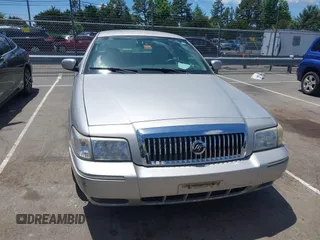 2009 Mercury Grand Marquis LS z VIN 2MEHM75V89X608107, wystawiony jako IAAI lot #42353116 z przebiegiem 82 261 mil mil oraz . Historia ofert i sprzedaży dostępna na DreamBid. Obrazek 6.