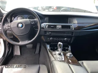 2013 BMW 5 Series 528i with VIN WBAXG5C5XDD233958, listed as a Copart auction lot 68722414 with 103,543 mi miles and . Bid and sale history available at carsss.com. Image 9.