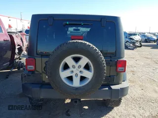 2015 Jeep Wrangler Unlimited Sport with VIN 1C4BJWDG5FL745673, listed as a IAAI auction lot 41681043 with 97,605 mi miles and . Bid and sale history available at DreamBid. Image 16.