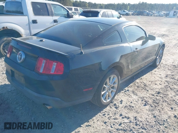 2010 Ford Mustang V6 with VIN 1ZVBP8AN0A5163231, listed as a IAAI auction lot 41876384 with 113,419 mi miles. Bid and sale history available at carsss.com. Image 4.