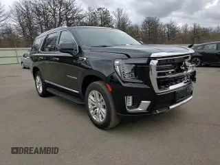 2022 GMC Yukon SLT with VIN 1GKS2BKD0NR290942, listed as a Copart auction lot 82338794 with 26,392 mi miles and Salvage Title. Bid and sale history available at carsss.com. Image 12.