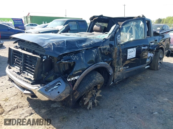 2021 Nissan Titan Pro-4X with VIN 1N6AA1ED4MN515673, listed as a IAAI auction lot 42028678 with 128,719 mi miles and . Bid and sale history available at DreamBid. Image 2.