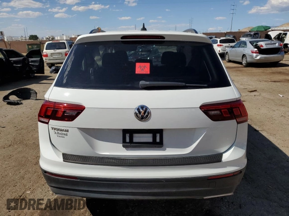 2021 Volkswagen Tiguan S z VIN 3VV1B7AX8MM065752, wystawiony jako Copart lot #62013905 z przebiegiem Nie podano mil oraz Szkoda całkowita • Salvage title. Historia ofert i sprzedaży dostępna na DreamBid. Obrazek 6.