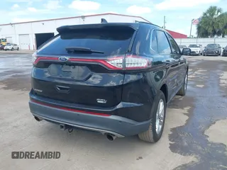 2015 Ford Edge SEL with VIN 2FMTK4J90FBB02669, listed as a IAAI auction lot 42176184 with 213,465 mi miles. Bid and sale history available at carsss.com. Image 4.