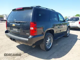 2012 Chevrolet Tahoe LT with VIN 1GNSCBE07CR122317, listed as a IAAI auction lot 41986360 with 172,505 mi miles and . Bid and sale history available at DreamBid. Image 4.