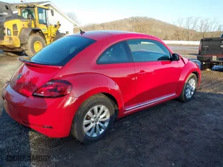 2019 Volkswagen Beetle S with VIN 3VWFD7AT1KM712384, listed as a IAAI auction lot 41505127 with 49,527 mi miles. Bid and sale history available at carsss.com. Image 4.