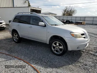 2006 Mitsubishi Outlander SE with VIN JA4LX41F46U051225, listed as a Copart auction lot 42949915 with 188,733 mi miles and Salvage Title. Bid and sale history available at carsss.com. Image 4.