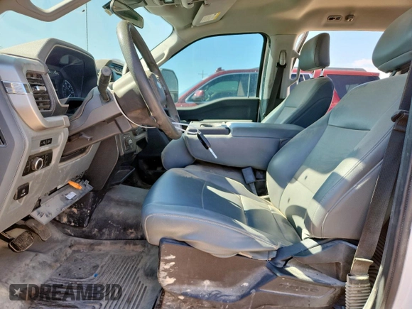 2022 Ford F-150 XL with VIN 1FTFW1E57NKE15119, listed as a Copart auction lot 60677985 with 79,006 mi miles and Salvage title. Bid and sale history available at DreamBid. Image 7.