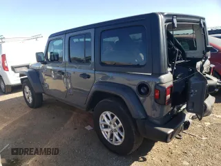 2023 Jeep Wrangler Sport with VIN 1C4HJXDN1PW701944, listed as a Copart auction lot 69973104 with 24,733 mi miles and Salvage Title. Bid and sale history available at DreamBid. Image 2.