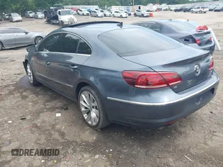 2013 Volkswagen CC Executive z VIN WVWGU7AN8DE520610, wystawiony jako IAAI lot #42278719 z przebiegiem 197 905 mil mil oraz . Historia ofert i sprzedaży dostępna na DreamBid. Obrazek 3.