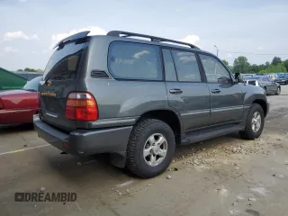 1999 Toyota Land Cruiser z VIN JT3HT05J8X0047612, wystawiony jako Copart lot #60983565 z przebiegiem 390 718 mil mil oraz Czysty tytuł • Clean title. Historia ofert i sprzedaży dostępna na DreamBid. Obrazek 3.