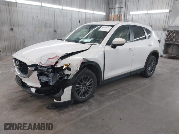 2017 Mazda CX-5 Touring with VIN JM3KFBCL9H0107589, listed as a IAAI auction lot 41241481 with 77,032 mi miles. Bid and sale history available at carsss.com. Image 20.