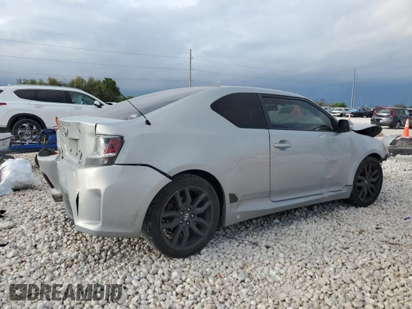 2014 Scion tC z VIN JTKJF5C79E3067932, wystawiony jako Copart lot #50425555 z przebiegiem Nie podano mil oraz Szkody całkowita. Historia ofert i sprzedaży dostępna na DreamBid. Obrazek 3.