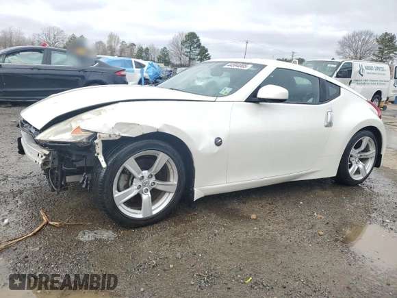 2012 Nissan 370Z z VIN JN1AZ4EHXCM562486, wystawiony jako Copart lot #44594005 z przebiegiem 79 150 mil mil oraz Szkoda całkowita • Salvage title. Historia ofert i sprzedaży dostępna na DreamBid. Obrazek 1.