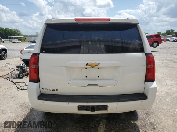 2015 Chevrolet Tahoe LT with VIN 1GNSCBKC8FR181394, listed as a Copart auction lot 53846435 with 191,875 mi miles and Salvage title. Bid and sale history available at DreamBid. Image 6.