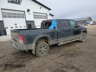 2015 Ram 3500 Laramie with VIN 3C63R3ML9FG590199, listed as a Copart auction lot 74700724 with 297,776 mi miles and Salvage Title. Bid and sale history available at carsss.com. Image 3.