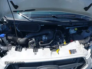2024 Ford Transit Cargo z VIN 1FTBR1C84RKA39388, wystawiony jako IAAI lot #42069825 z przebiegiem 20 851 mil mil oraz . Historia ofert i sprzedaży dostępna na DreamBid. Obrazek 10.