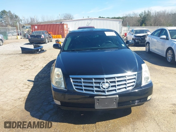 2006 Cadillac DTS Professional z VIN 1GEEH96Y56U550027, wystawiony jako IAAI lot #41663248 z przebiegiem 58 471 mil mil oraz . Historia ofert i sprzedaży dostępna na DreamBid. Obrazek 13.