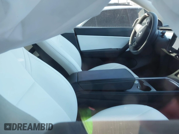 2021 Tesla Model Y Long Range with VIN 5YJYGDEE5MF203175, listed as a IAAI auction lot 41758334 with 63,387 mi miles and . Bid and sale history available at DreamBid. Image 5.