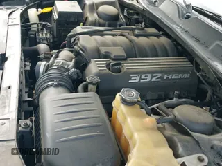 2011 Dodge Challenger SRT-8 z VIN 2B3CJ7DJ8BH597193, wystawiony jako IAAI lot #42069775 z przebiegiem 99 645 mil mil oraz . Historia ofert i sprzedaży dostępna na DreamBid. Obrazek 19.