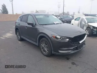 2017 Mazda CX-5 Touring with VIN JM3KFACL6H0161118, listed as a IAAI auction lot 41985719 with 50,309 mi miles. Bid and sale history available at carsss.com. Image 1.