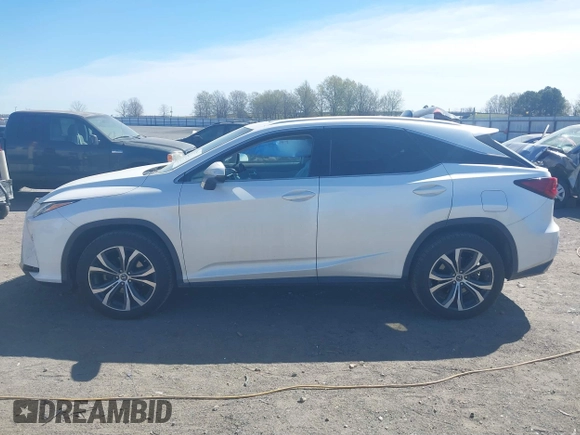 2018 Lexus RX 350 z VIN 2T2BZMCAXJC144930, wystawiony jako IAAI lot #41857778 z przebiegiem 108 191 mil mil oraz . Historia ofert i sprzedaży dostępna na DreamBid. Obrazek 14.
