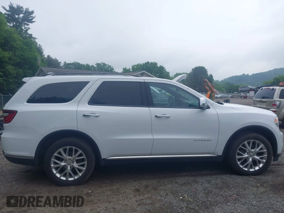 2015 Dodge Durango Citadel z VIN 1C4SDJET4FC688548, wystawiony jako IAAI lot #42448775 z przebiegiem 157 297 mil mil oraz . Historia ofert i sprzedaży dostępna na DreamBid. Obrazek 13.
