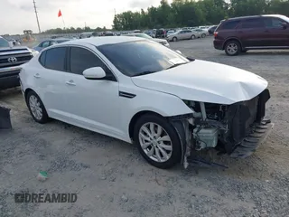 2014 Kia Optima EX z VIN 5XXGN4A75EG295637, wystawiony jako IAAI lot #42226355 z przebiegiem 196 000 mil mil oraz . Historia ofert i sprzedaży dostępna na DreamBid. Obrazek 1.