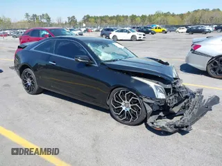 2015 Cadillac ATS Luxury AWD z VIN 1G6AH1RX0F0113252, wystawiony jako IAAI lot #41891786 z przebiegiem 136 902 mil mil oraz . Historia ofert i sprzedaży dostępna na DreamBid. Obrazek 1.