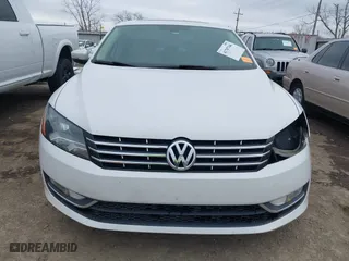 2013 Volkswagen Passat TDI SE with VIN 1VWBN7A34DC075197, listed as a IAAI auction lot 41707346 with 188,685 mi miles. Bid and sale history available at carsss.com. Image 13.