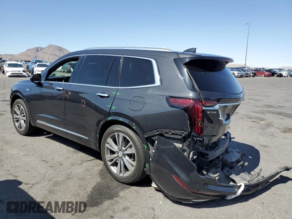 2020 Cadillac XT6 FWD Premium Luxury z VIN 1GYKPCRS9LZ126510, wystawiony jako Copart lot #58240585 z przebiegiem 57 156 mil mil oraz Szkoda całkowita • Salvage title. Historia ofert i sprzedaży dostępna na DreamBid. Obrazek 2.