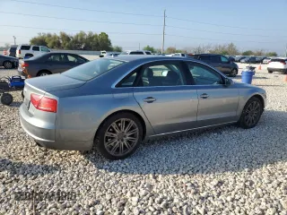 2012 Audi A8 with VIN WAURVAFD4CN023004, listed as a Copart auction lot 50181715 with 121,590 mi miles and Salvage title. Bid and sale history available at DreamBid. Image 3.