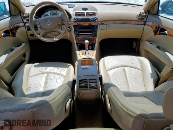 2009 Mercedes-Benz E-Class Luxury 3.5L with VIN WDBUF56X09B396917, listed as a Copart auction lot 52769485 with 142,968 mi miles and Salvage Title. Bid and sale history available at carsss.com. Image 8.