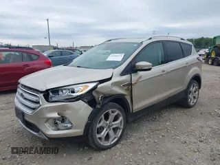 2018 Ford Escape Titanium with VIN 1FMCU9J94JUA44964, listed as a IAAI auction lot 42494471 with 100,955 mi miles and . Bid and sale history available at DreamBid. Image 6.