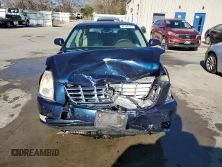 2006 Cadillac DTS 1SB z VIN 1G6KD57Y56U220535, wystawiony jako Copart lot #89196185 z przebiegiem 94 312 mil mil oraz Szkody całkowita. Historia ofert i sprzedaży dostępna na DreamBid. Obrazek 5.