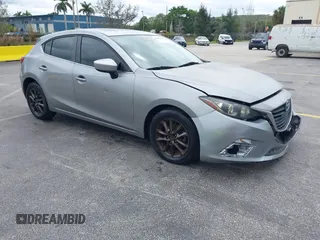 2014 Mazda 3 i Grand Touring with VIN JM1BM1M73E1216596, listed as a IAAI auction lot 41621165 with 127,235 mi miles and . Bid and sale history available at DreamBid. Image 1.