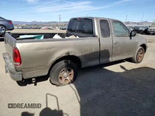 2003 Ford F-150 XL with VIN 1FTRX17L93NB77050, listed as a Copart auction lot 77107564 with 0 mi miles and Salvage Title. Bid and sale history available at carsss.com. Image 3.