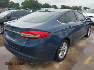 2018 Ford Fusion SE with VIN 3FA6P0H73JR109454, listed as a IAAI auction lot 42438366 with 105,802 mi miles and . Bid and sale history available at DreamBid. Image 4.