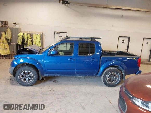 2015 Nissan Frontier SV with VIN 1N6AD0EV4FN709892, listed as a IAAI auction lot 42473594 with 153,103 mi miles and . Bid and sale history available at DreamBid. Image 14.