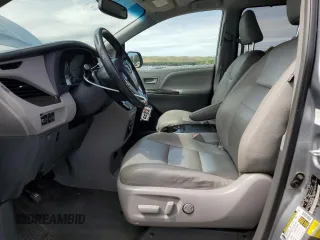 2015 Toyota Sienna XLE with VIN 5TDYK3DC2FS529006, listed as a Copart auction lot 62750995 with 142,990 mi miles and Salvage title. Bid and sale history available at DreamBid. Image 7.