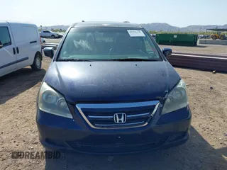 2005 Honda Odyssey EX-L with VIN 5FNRL38755B007567, listed as a IAAI auction lot 41952348 with 183,514 mi miles and . Bid and sale history available at carsss.com. Image 6.