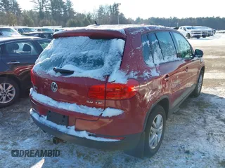 2013 Volkswagen Tiguan S with VIN WVGAV3AX1DW098392, listed as a IAAI auction lot 41420676 with 75,279 mi miles and . Bid and sale history available at DreamBid. Image 4.