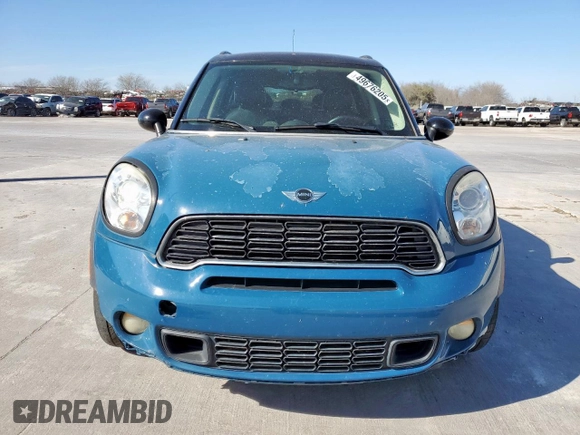 2012 MINI Countryman S with VIN WMWZC3C5XCWM27675, listed as a Copart auction lot 49676205 with 111,499 mi miles and Salvage title. Bid and sale history available at DreamBid. Image 5.