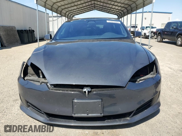 2016 Tesla Model S 90D with VIN 5YJSA1E22GF177120, listed as a Copart auction lot 51972885 with 73,441 mi miles and Salvage title. Bid and sale history available at DreamBid. Image 5.