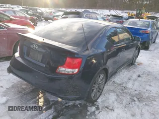 2011 Scion tC z VIN JTKJF5C78B3018653, wystawiony jako IAAI lot #41588371 z przebiegiem 143 038 mil mil oraz . Historia ofert i sprzedaży dostępna na DreamBid. Obrazek 4.