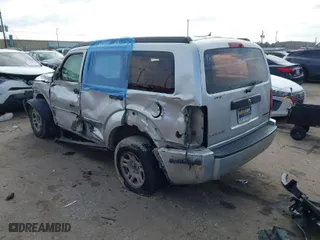 2010 Dodge Nitro SE with VIN 1D4PT2GK2AW125916, listed as a IAAI auction lot 41566224 with 396,687 mi miles. Bid and sale history available at carsss.com. Image 3.